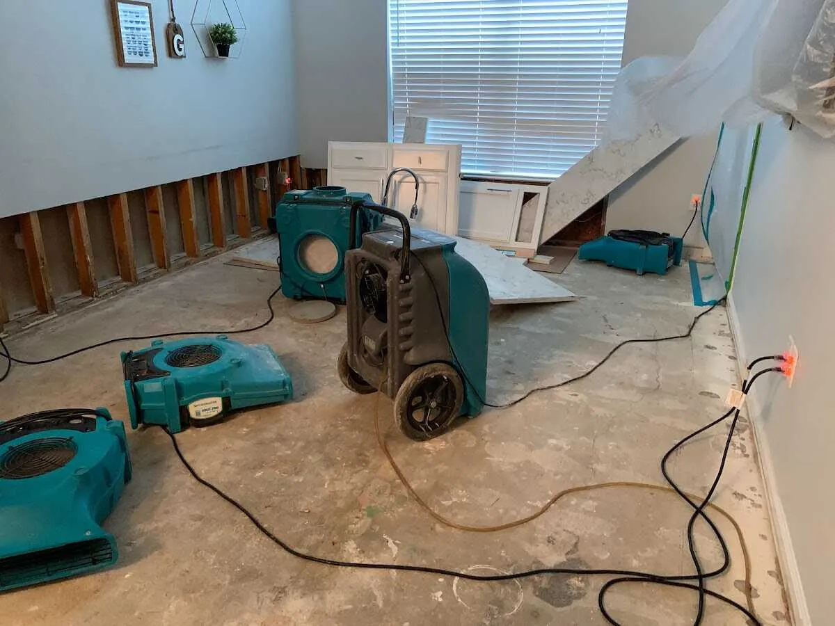 Dehumidifier in flood-cut room for Water Damage Restoration in Chaska
